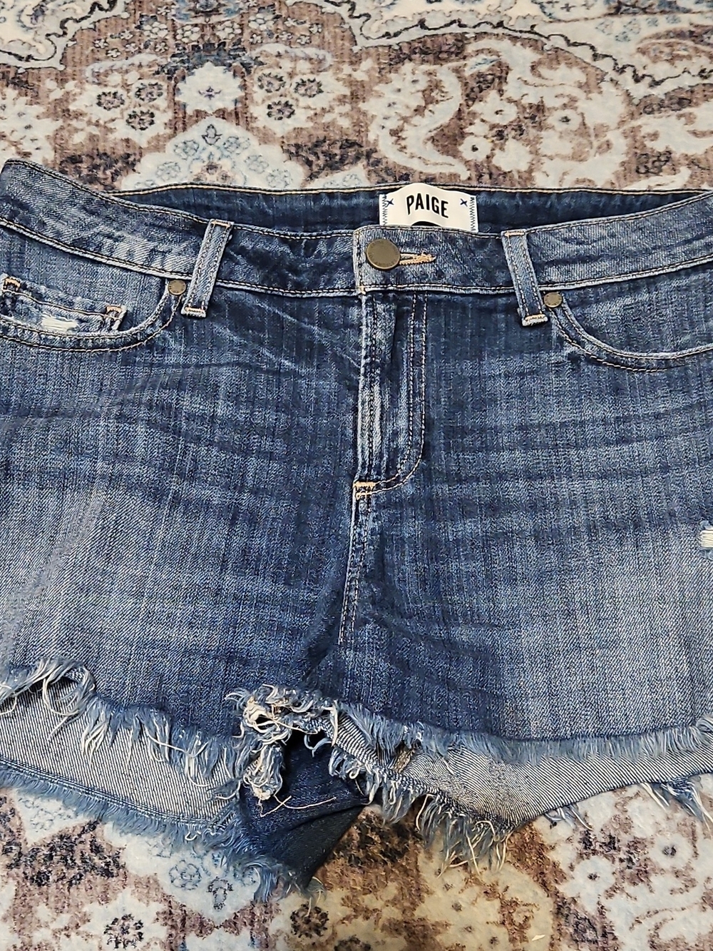 PAIGE Distressed Denim Cutoff Shorts - Medium Blue